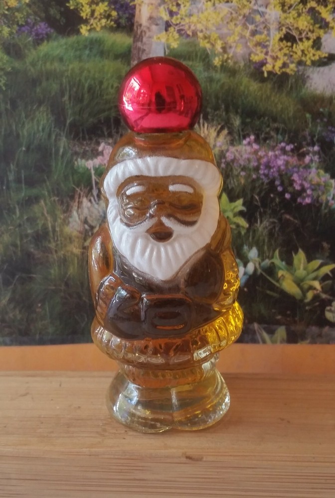 Topaze cologne, Avon. Jolly Santa splash perfume bottle full 1 fl oz