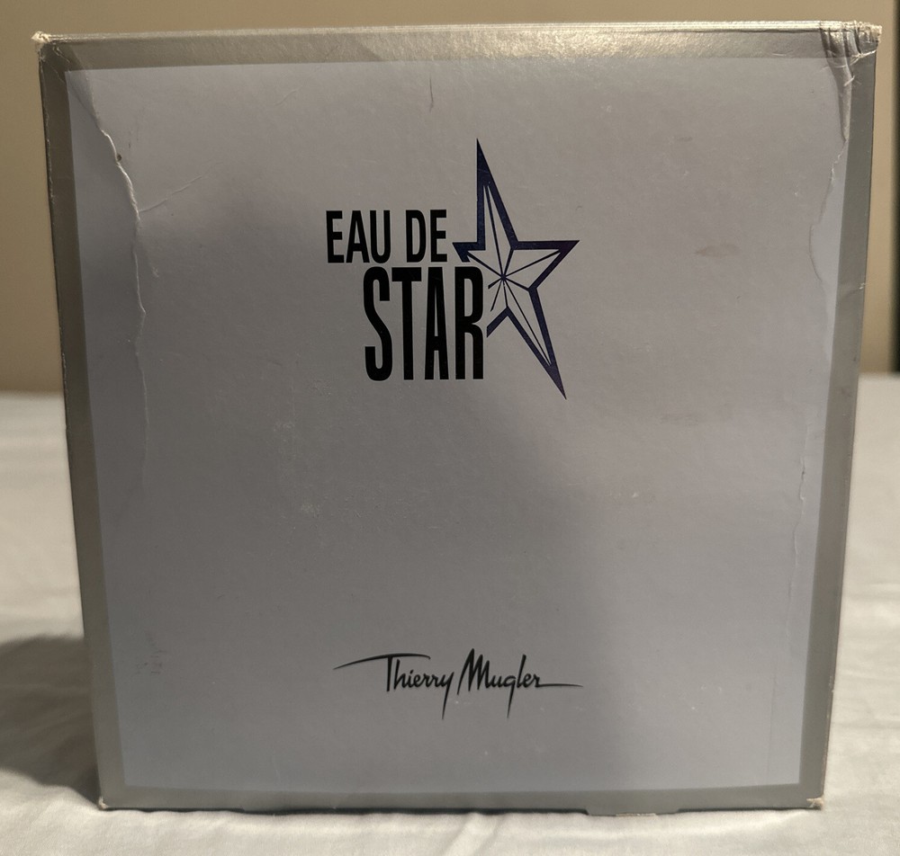 Thierry Muller 0.8 Fl. Oz Eau De Star Set: 0.13 OzLip Gloss & Full Size Star Bag